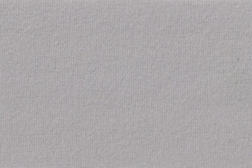V91 A sheet of high-quality fabric in a neutral grey shade, ideal for the bedroom for comfort and elegance.